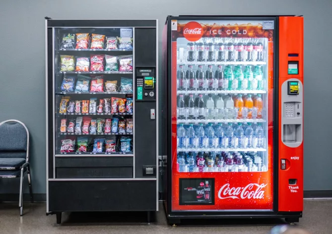 two-vending-machines-next-to-two-chairs-Post-Featured-Image